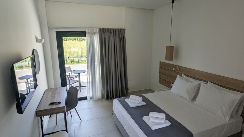 Imagen de la habitación del Hotel Costa Ionica Mytikas Seaside. Foto 20