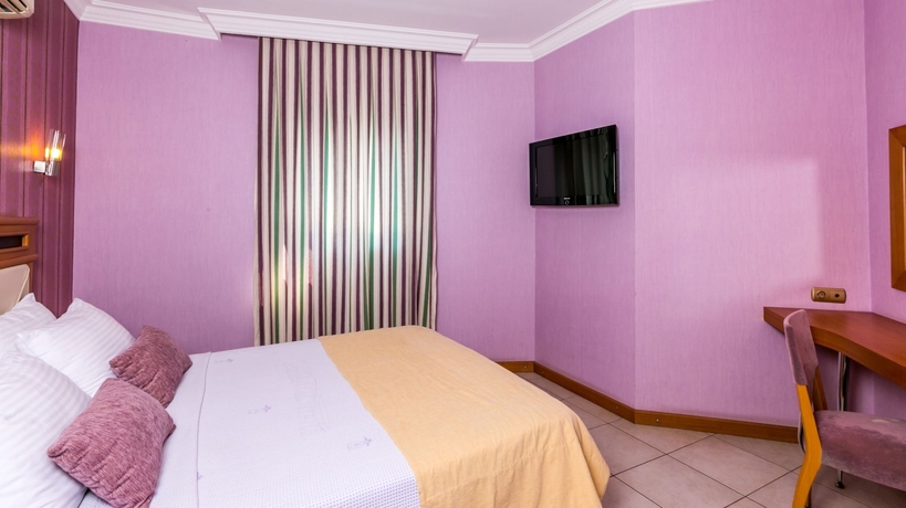 Imagen de la habitación del Hotel Costa Mare Suites. Foto 7