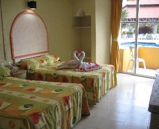 Imagen de la habitación del Hotel Costa Sol Hotel & Villas. Foto 5