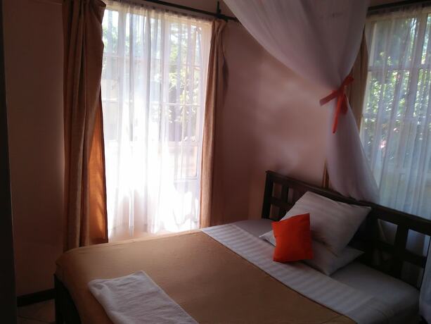 Imagen de la habitación del Hotel Cosy Garden. Foto 10