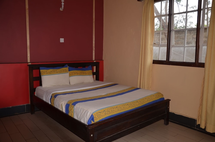 Imagen de la habitación del Hotel Cosy Garden Guest House. Foto 6