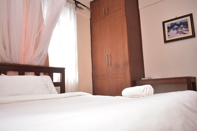 Imagen de la habitación del Hotel Cosy Garden Guest House. Foto 7