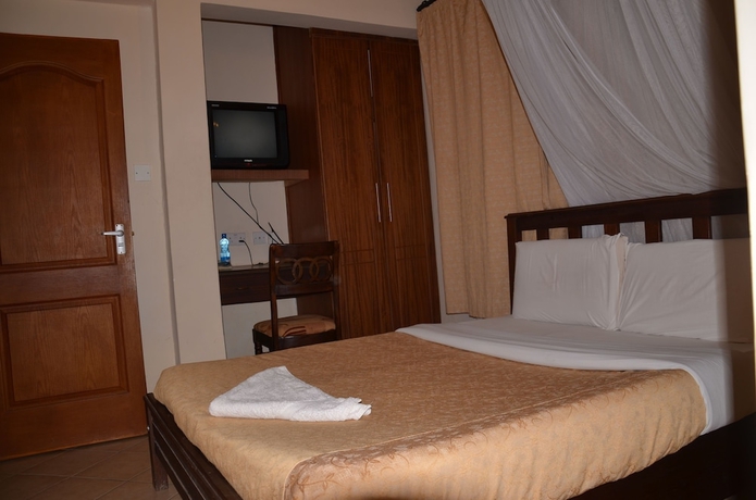 Imagen de la habitación del Hotel Cosy Garden Guest House. Foto 8