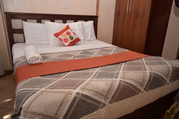 Imagen de la habitación del Hotel Cosy Garden Guest House. Foto 9