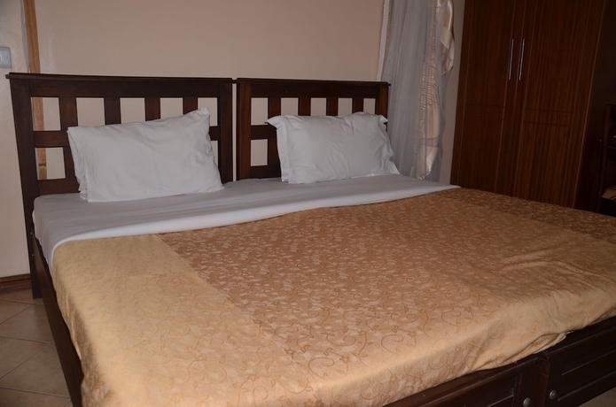 Imagen de la habitación del Hotel Cosy Garden Guest House. Foto 10