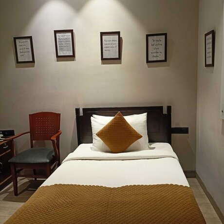 Imagen de la habitación del Hotel Cosy Grand. Foto 17