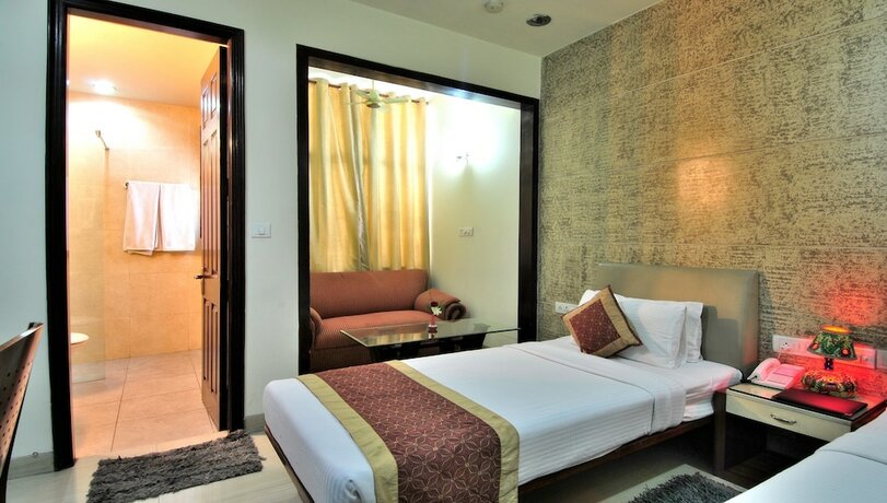 Imagen de la habitación del Hotel Cosy Grand. Foto 18