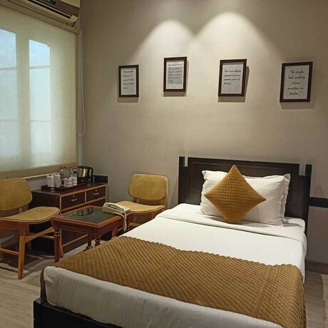 Imagen de la habitación del Hotel Cosy Grand. Foto 26