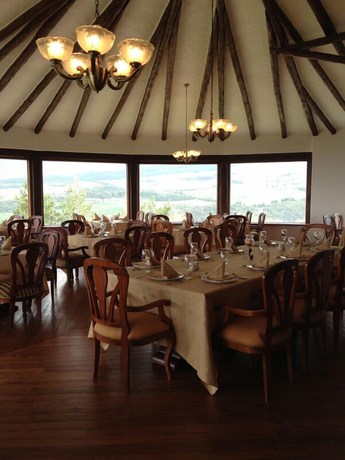 Imagen del bar/restaurante del Hotel CotopaxiPungo Finca. Foto 5