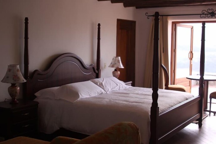 Imagen de la habitación del Hotel CotopaxiPungo Finca. Foto 8
