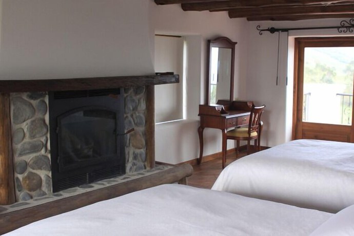 Imagen de la habitación del Hotel CotopaxiPungo Finca. Foto 10
