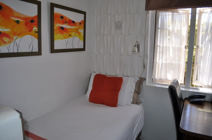 Imagen de la habitación del Hotel Cotswold House, Cape Town. Foto 8