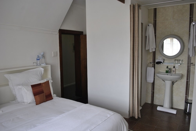 Imagen de la habitación del Hotel Cotswold House, Cape Town. Foto 13