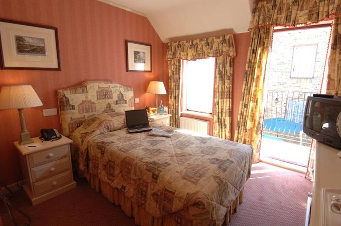 Imagen de la habitación del Hotel Cotswold Lodge. Foto 11