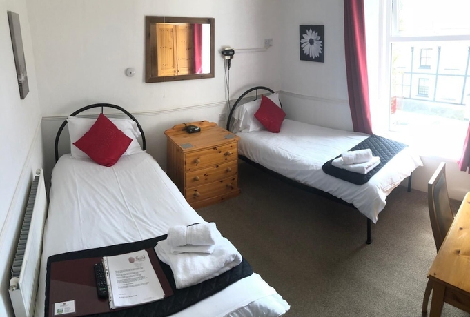 Imagen de la habitación del Hotel Cottage Court. Foto 13