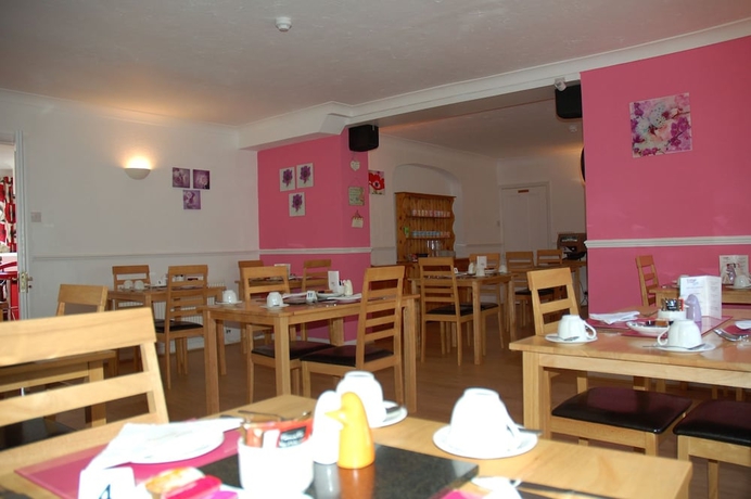 Imagen del bar/restaurante del Hotel Cottage Court. Foto 4