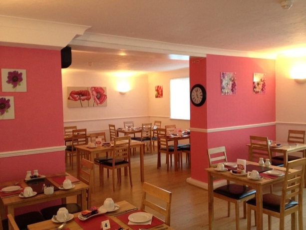 Imagen del bar/restaurante del Hotel Cottage Court. Foto 8
