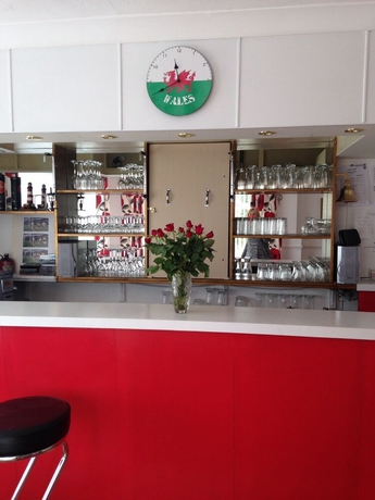 Imagen del bar/restaurante del Hotel Cottage Court. Foto 9