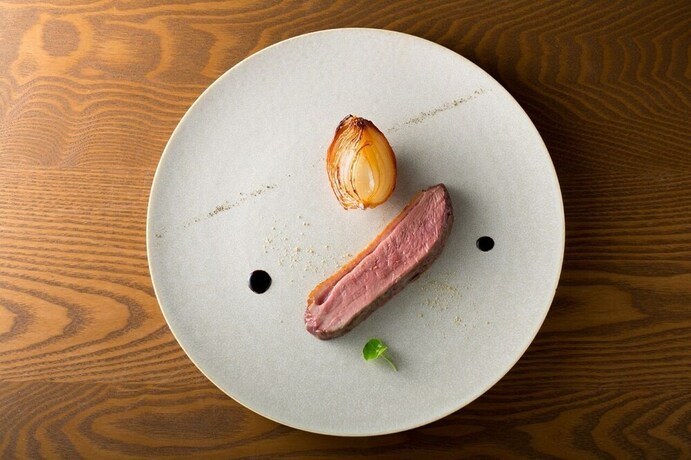 Imagen del bar/restaurante del Hotel Cottage Ekara. Foto 34