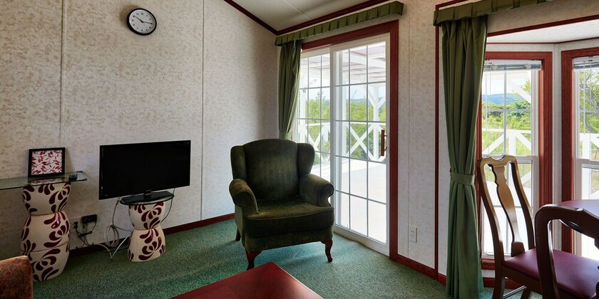 Imagen de la habitación del Hotel Cottage House Ryukyu. Foto 5