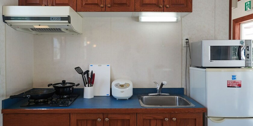 Imagen de la habitación del Hotel Cottage House Ryukyu. Foto 7