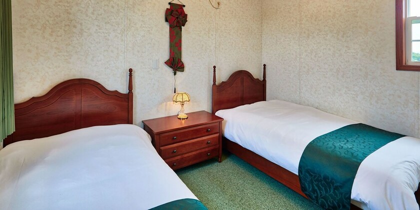 Imagen de la habitación del Hotel Cottage House Ryukyu. Foto 10