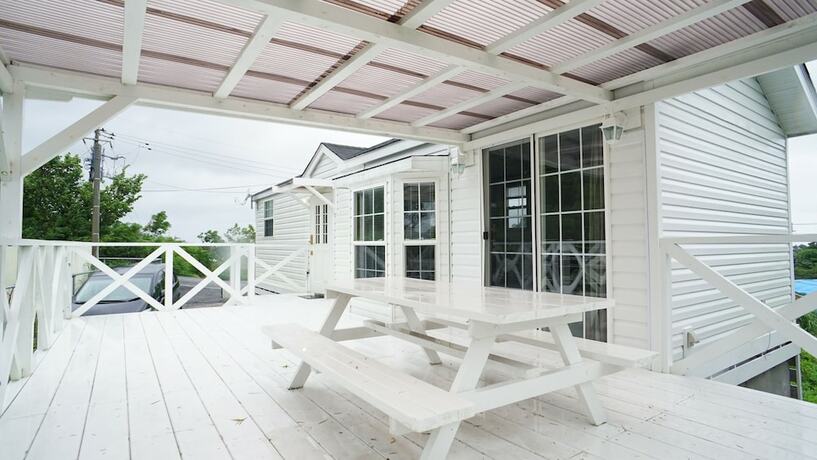 Imagen de los exteriores del Hotel Cottage House Ryukyu. Foto 15