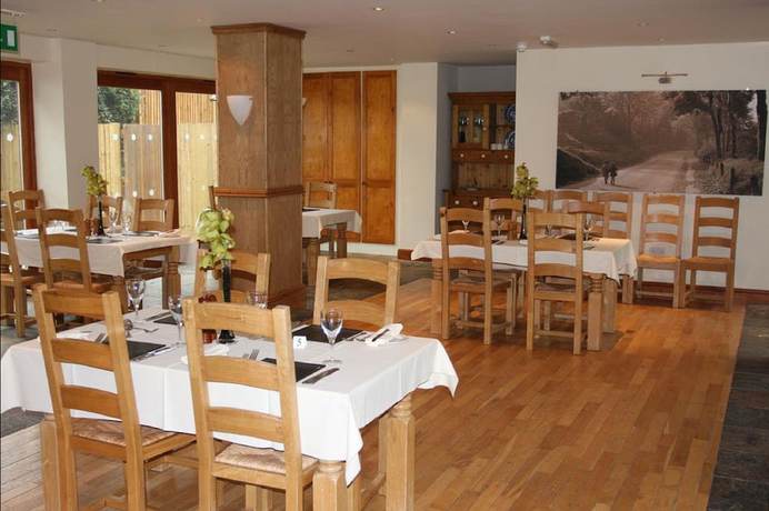 Imagen del bar/restaurante del Hotel Cottage Lea\'s Country and Restaurant. Foto 3