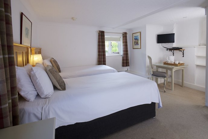 Imagen de la habitación del Hotel Cottage Lodge. Foto 2