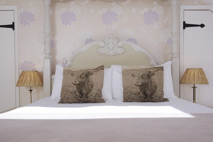 Imagen de la habitación del Hotel Cottage Lodge. Foto 4