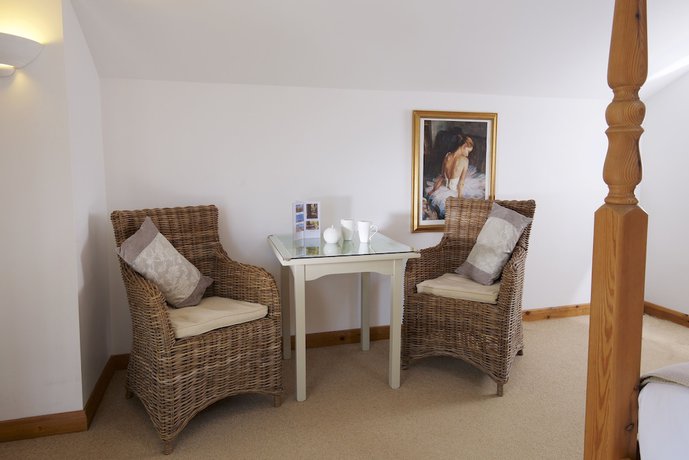 Imagen de la habitación del Hotel Cottage Lodge. Foto 5