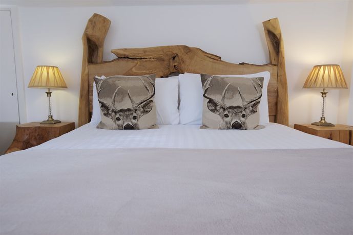 Imagen de la habitación del Hotel Cottage Lodge. Foto 6