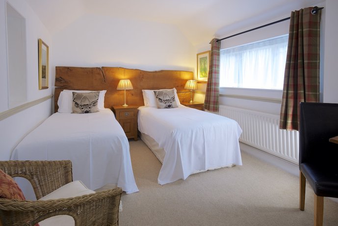 Imagen de la habitación del Hotel Cottage Lodge. Foto 9