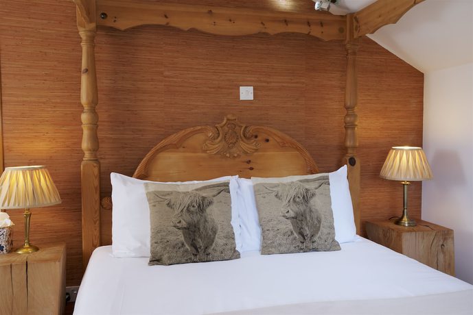 Imagen de la habitación del Hotel Cottage Lodge. Foto 13