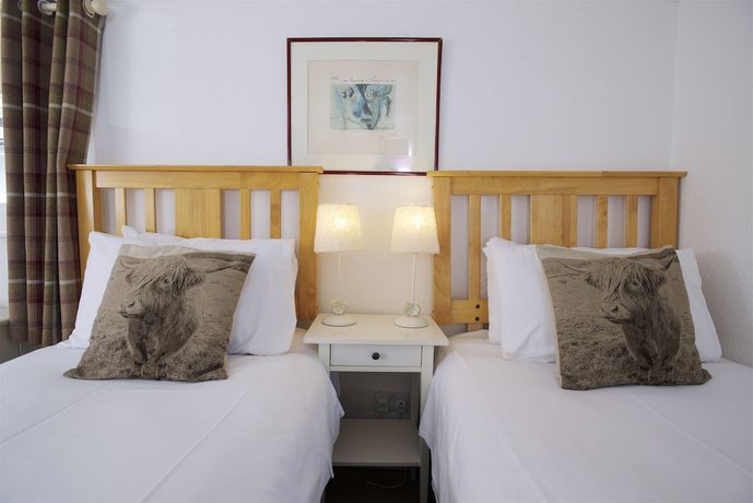 Imagen de la habitación del Hotel Cottage Lodge. Foto 19