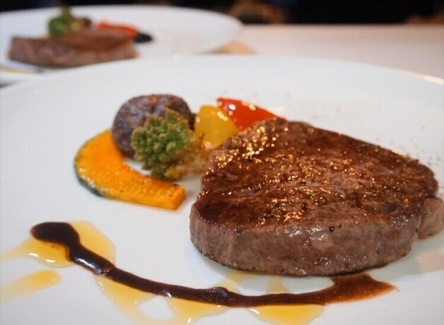 Imagen del bar/restaurante del Hotel Cottage MAKAI. Foto 10