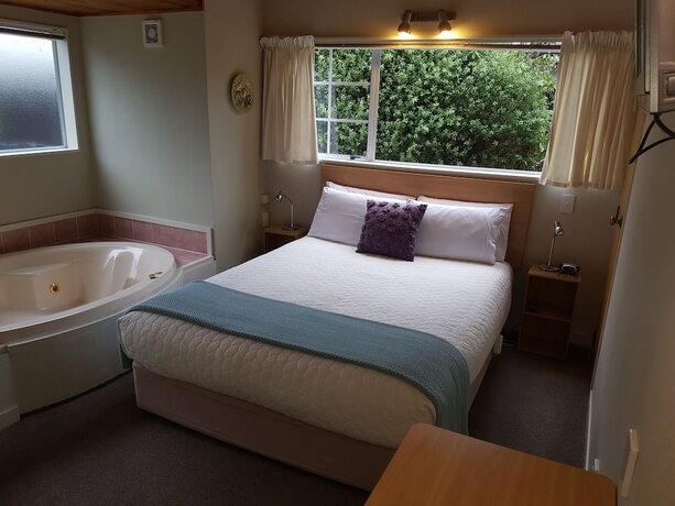 Imagen de la habitación del Hotel Cottage Mews Motel. Foto 15