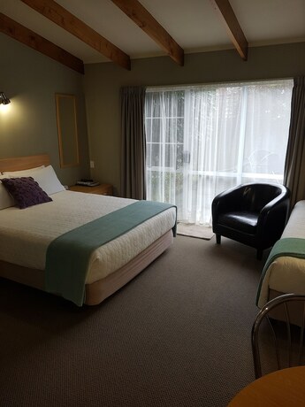 Imagen de la habitación del Hotel Cottage Mews Motel. Foto 16