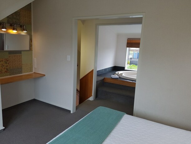 Imagen de la habitación del Hotel Cottage Mews Motel. Foto 19