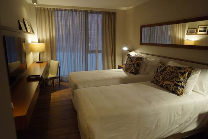 Imagen de la habitación del Hotel Cottage Puerto Buceo City. Foto 11