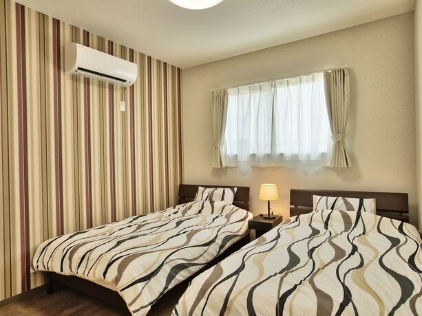 Imagen general del Hotel Cottage Seawind NAKIJIN. Foto 7