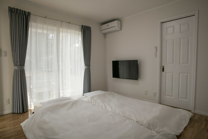 Imagen de la habitación del Hotel Cottage Yushin. Foto 22