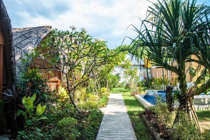 Imagen de los exteriores del Hotel Cotton Tree Cottages. Foto 8