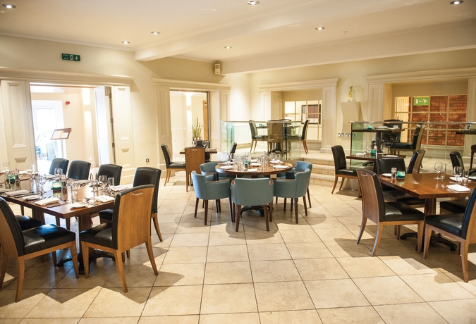 Imagen del bar/restaurante del Hotel Cottons and Spa. Foto 6