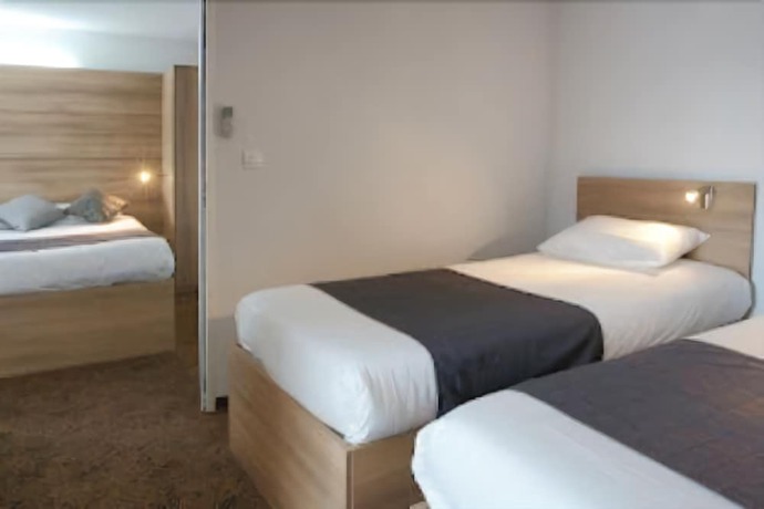Imagen de la habitación del Hotel Couett\'h&ocirc;tel Loud&eacute;ac. Foto 6
