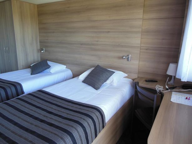 Imagen de la habitación del Hotel Couett\'h&ocirc;tel Loud&eacute;ac. Foto 12