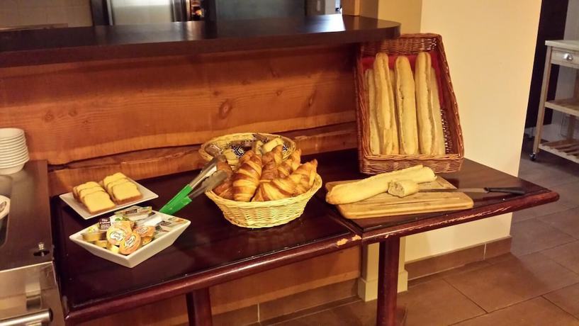 Imagen del bar/restaurante del Hotel Couett\'h&ocirc;tel Loud&eacute;ac. Foto 4