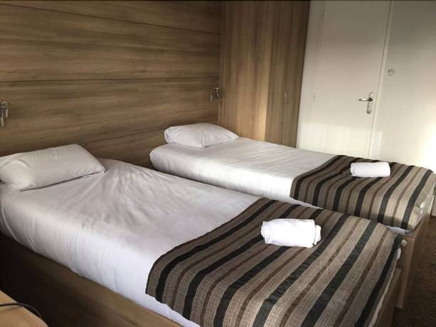 Imagen de la habitación del Hotel Couett\'h&ocirc;tel Loud&eacute;ac. Foto 14