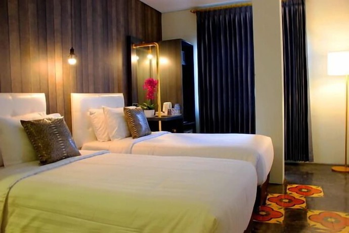Imagen de la habitación del Hotel Couleur Jakarta. Foto 6