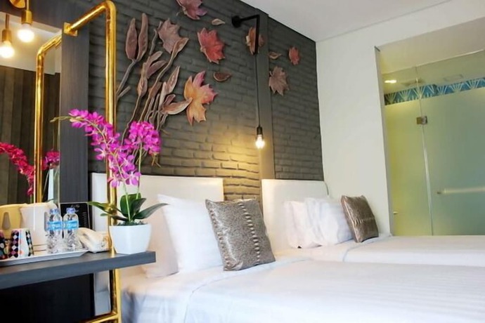 Imagen de la habitación del Hotel Couleur Jakarta. Foto 9